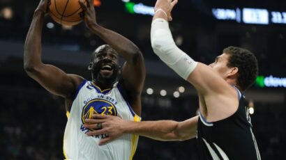 Milwaukee is investigating an incident between their fan and Draymond Green