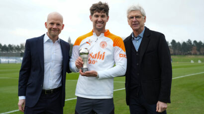 Arsène Wenger visits Man City training grounds to hand Awards