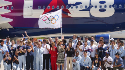 Olympics fever hits Los Angeles as flag arrives in LA