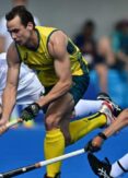 An Australian field hockey player has been arrested at the Olympic Village for purchasing cocaine, causing a shock among the athletes