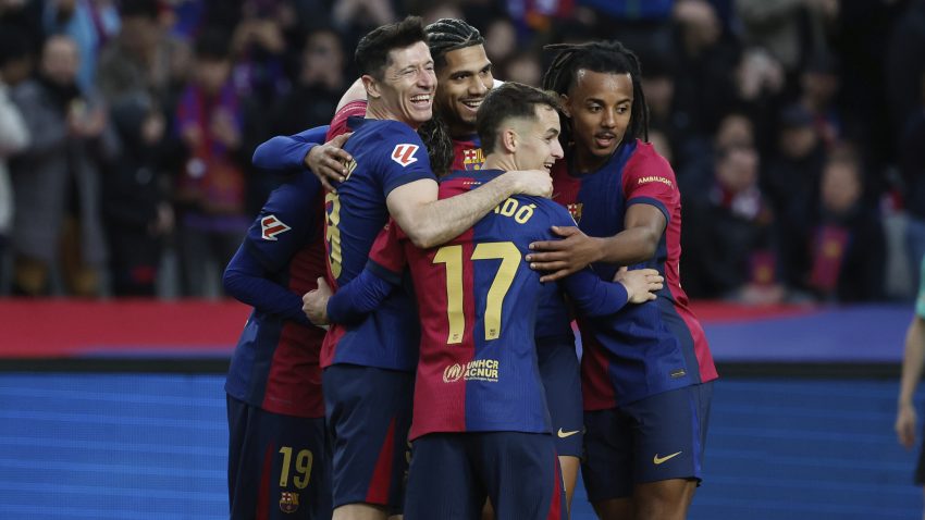 Barcelona dominates Osasuna 3-0 to extend La Liga lead