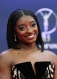 Simone Biles expresses regret over remarks in online dispute with Riley Gaines