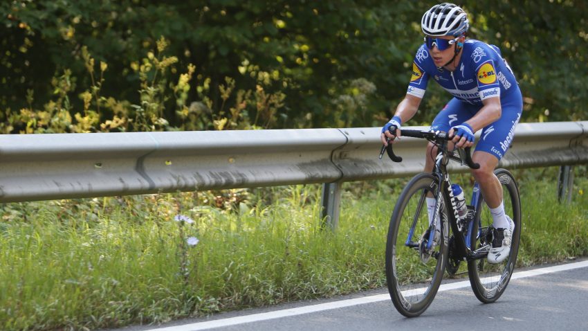 Evenepoel wins time trial, Pogacar takes yellow
