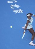 Gauff survives tough test to reach last 16 in Beijing