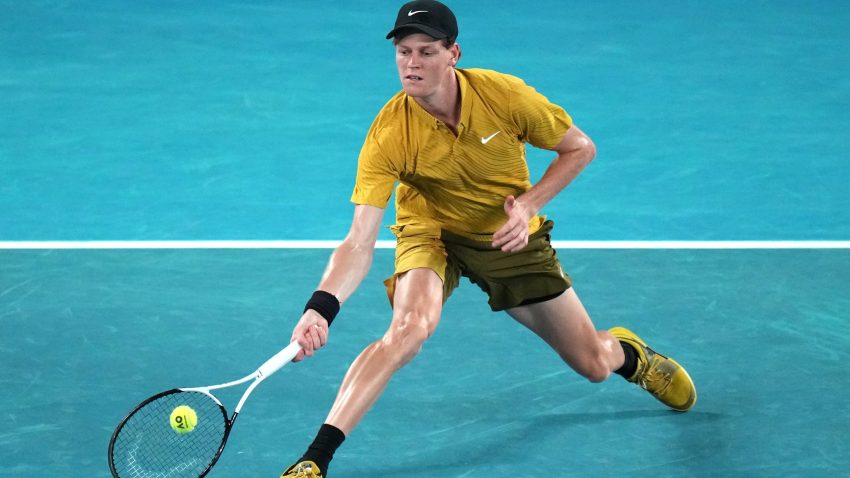 Sinner battles heat and cramp to reach Australian Open fourth round