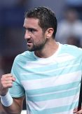 Cilic and Wawrinka reach second round at Australian Open