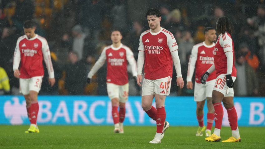 Arsenal throw away lead as Wolves snatch late point