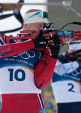 Johannes Dale Skjevdal wins biathlon mass start gold at Winter Olympics